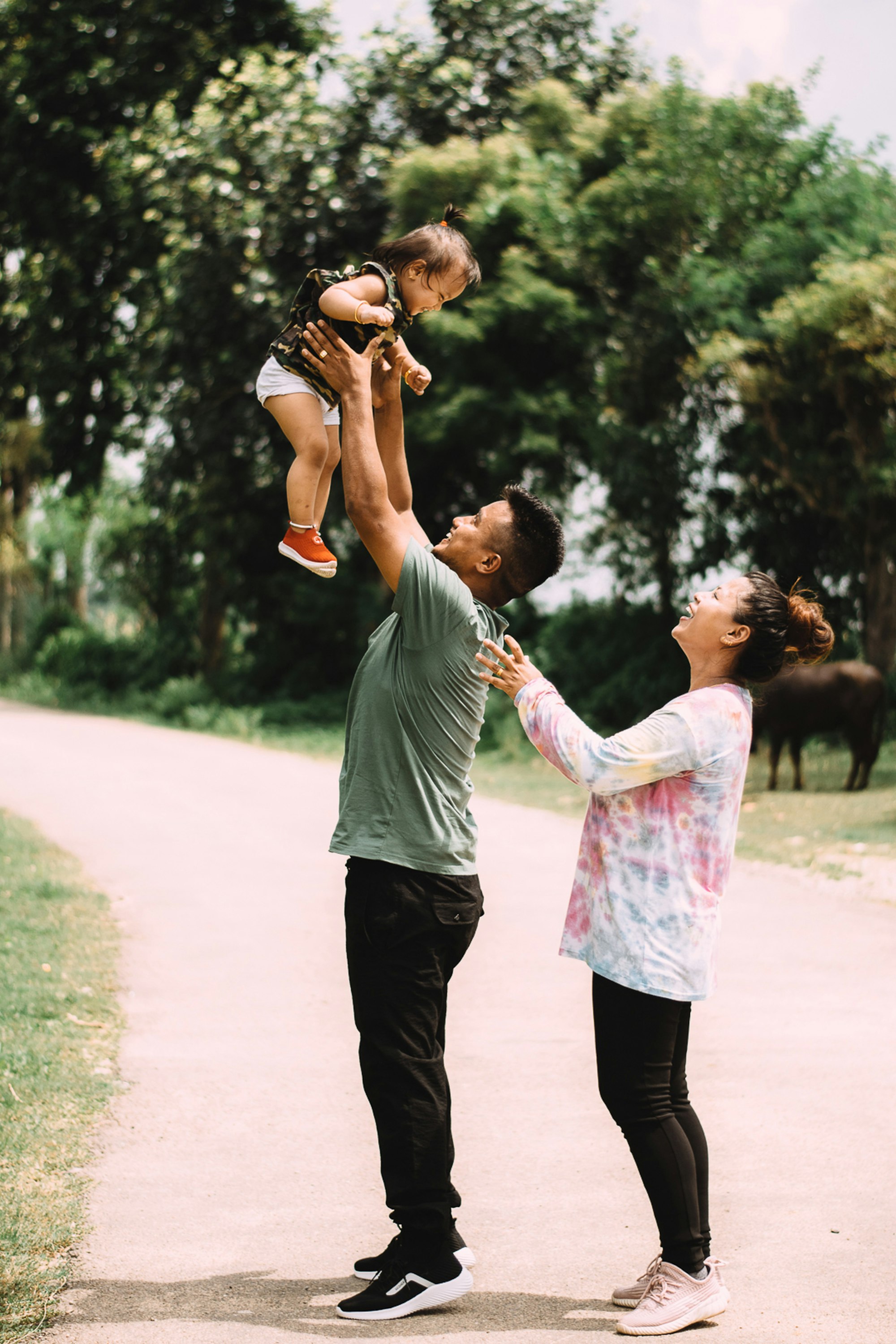 PLACEHOLDER (Unsplash) — father carrying daughter